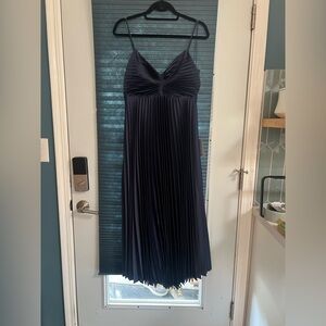 LUSH NAVY SATIN EMPIRE PLEATED DRESS.